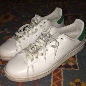 Stan Smith Adidas sneakers.            Gucci Nike
